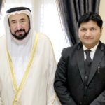 Mujeeb Jaihoon presents SLOGANS OF THE SAGE to Dr. Sheikh Sultan, ruler of Sharjah